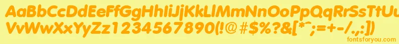 フォントVolkswagenExtraboldita – オレンジの文字が黄色の背景にあります。