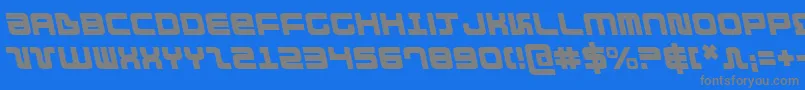 DirektorLeftalic-fontti – harmaat kirjasimet sinisellä taustalla