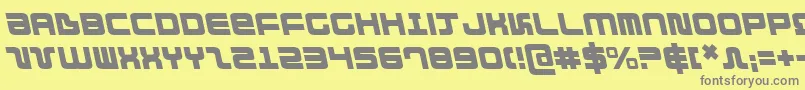 DirektorLeftalic-fontti – harmaat kirjasimet keltaisella taustalla
