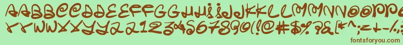 Swirlstory Font – Brown Fonts on Green Background