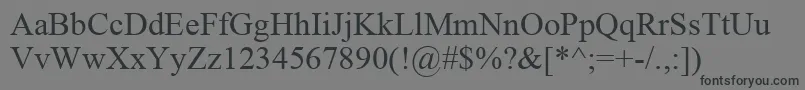 フォントIskoolaPota – 黒い文字の灰色の背景