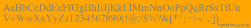 IskoolaPota-Schriftart – Graue Schriften auf orangefarbenem Hintergrund