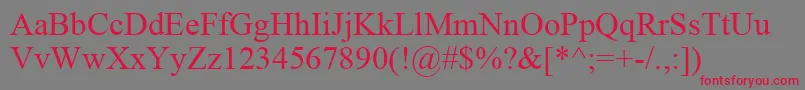 フォントIskoolaPota – 赤い文字の灰色の背景