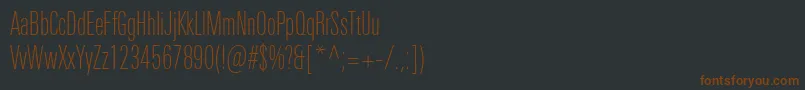 Шрифт UniversNextProThinCompressed – коричневые шрифты на чёрном фоне