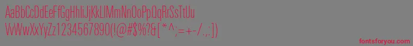 フォントUniversNextProThinCompressed – 赤い文字の灰色の背景