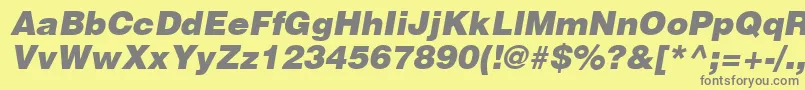 Fonte HelveticaLtBlackOblique – fontes cinzas em um fundo amarelo