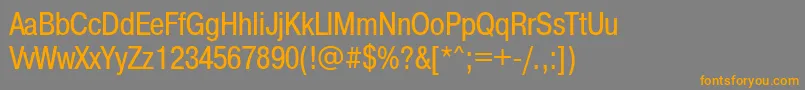 フォントPragmaticacondett – オレンジの文字は灰色の背景にあります。