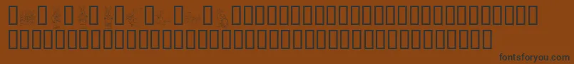 KrEasterDings Font – Black Fonts on Brown Background