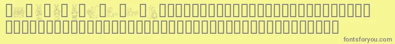 KrEasterDings-fontti – harmaat kirjasimet keltaisella taustalla
