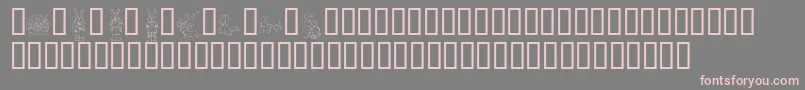 フォントKrEasterDings – 灰色の背景にピンクのフォント