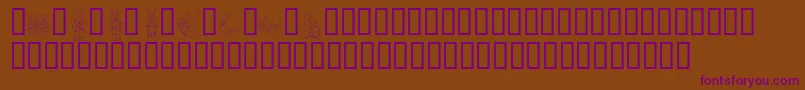 Czcionka KrEasterDings – fioletowe czcionki na brązowym tle