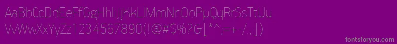 Fonte PfhandbookproExtrathin – fontes cinzas em um fundo violeta