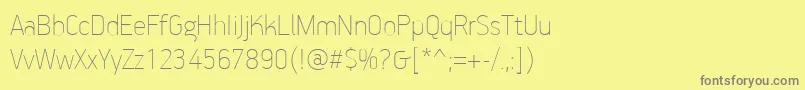 PfhandbookproExtrathin-Schriftart – Graue Schriften auf gelbem Hintergrund