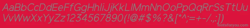 ElliotsansRegularitalic-Schriftart – Graue Schriften auf rotem Hintergrund