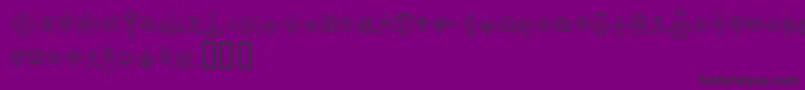 Шрифт Jiggerypokery – чёрные шрифты на фиолетовом фоне