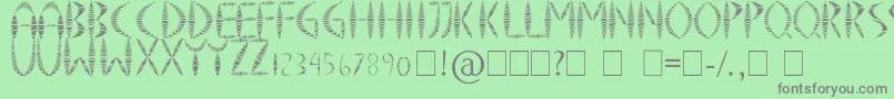 SpringyFancy Font – Gray Fonts on Green Background