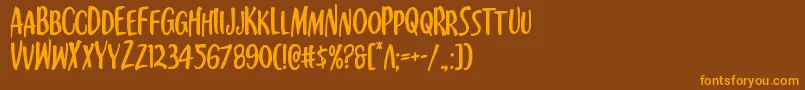 Шрифт Kennebunkport – оранжевые шрифты на коричневом фоне