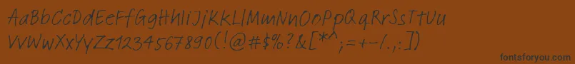 LinotypeFeltpenRegular-Schriftart – Schwarze Schriften auf braunem Hintergrund