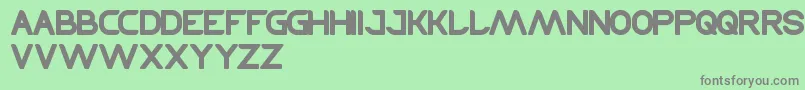 フォントTechnique – 緑の背景に灰色の文字