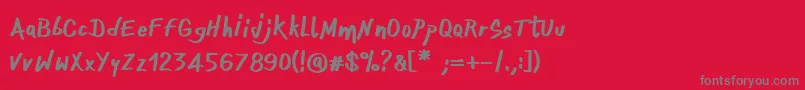 OnefingerCre-fontti – harmaat kirjasimet punaisella taustalla