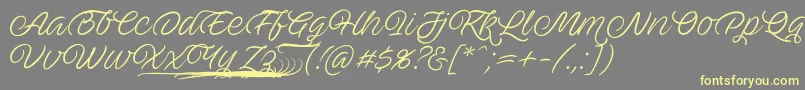 AveutanPersonalUse-Schriftart – Gelbe Schriften auf grauem Hintergrund