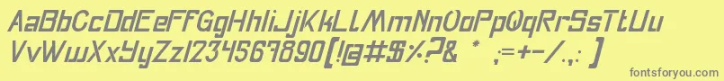Fly-fontti – harmaat kirjasimet keltaisella taustalla