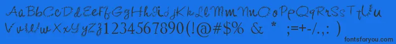 KishoreDistort Font – Black Fonts on Blue Background