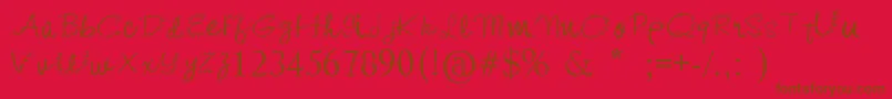 フォントKishoreDistort – 赤い背景に茶色の文字