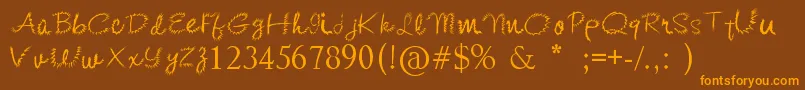 KishoreDistort Font – Orange Fonts on Brown Background