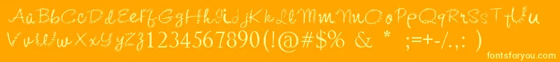 KishoreDistort Font – Yellow Fonts on Orange Background