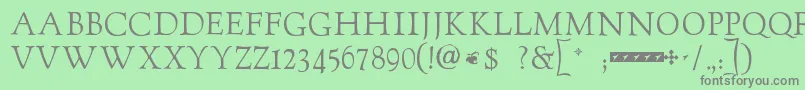 フォントGoudytwenty – 緑の背景に灰色の文字