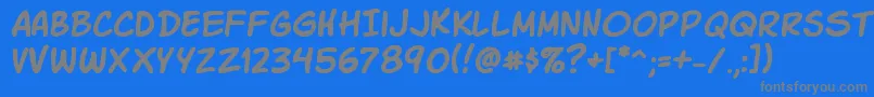 フォントKomikaSlick – 青い背景に灰色の文字