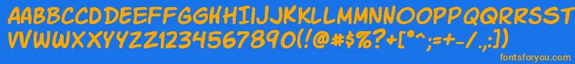 KomikaSlick Font – Orange Fonts on Blue Background