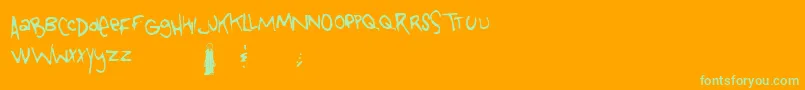 Tongueofcolicab-Schriftart – Grüne Schriften auf orangefarbenem Hintergrund