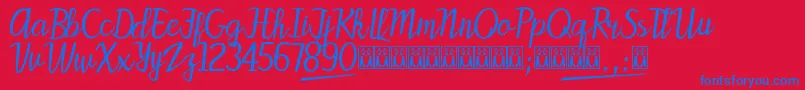 PattyLabelle-Schriftart – Blaue Schriften auf rotem Hintergrund