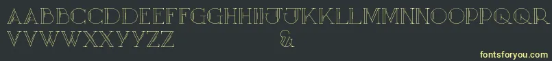 フォントMaryCapsOutline – 黒い背景に黄色の文字