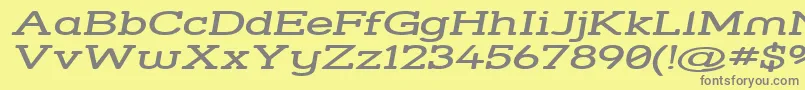 Strsswi-fontti – harmaat kirjasimet keltaisella taustalla