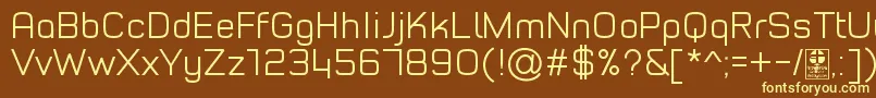 TypoStyleLightDemo-fontti – keltaiset fontit ruskealla taustalla