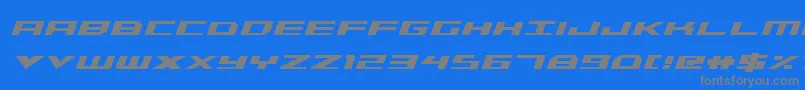 TriremeCondensedBoldItalic-Schriftart – Graue Schriften auf blauem Hintergrund