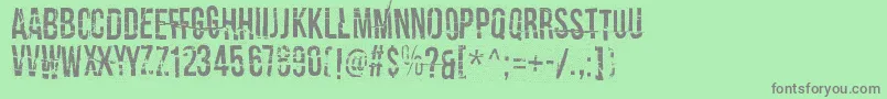 フォントCrashTestDummy – 緑の背景に灰色の文字