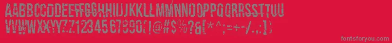 フォントCrashTestDummy – 赤い背景に灰色の文字