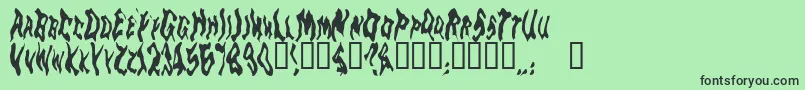 Goblinm Font – Black Fonts on Green Background