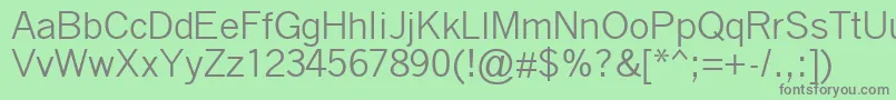 フォントQuicktype – 緑の背景に灰色の文字