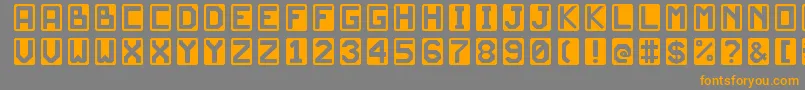 フォントJdScarabeoLight – オレンジの文字は灰色の背景にあります。