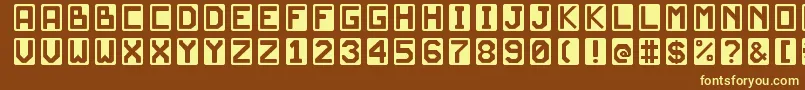 JdScarabeoLight-fontti – keltaiset fontit ruskealla taustalla