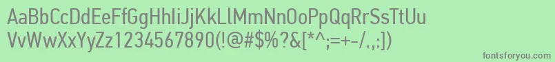 PfdintextcondproRegular-fontti – harmaat kirjasimet vihreällä taustalla