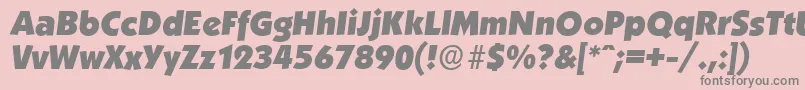 Fonte KoblenzserialHeavyItalic – fontes cinzas em um fundo rosa