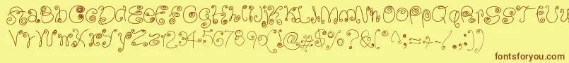 SquigglyLittleWiggly Font – Brown Fonts on Yellow Background