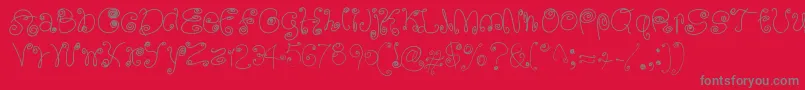 Więcej informacji o czcionce SquigglyLittleWiggly Czcionka SquigglyLittleWiggly – szare czcionki na czerwonym tle