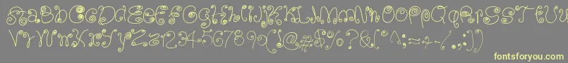 SquigglyLittleWiggly Font – Yellow Fonts on Gray Background